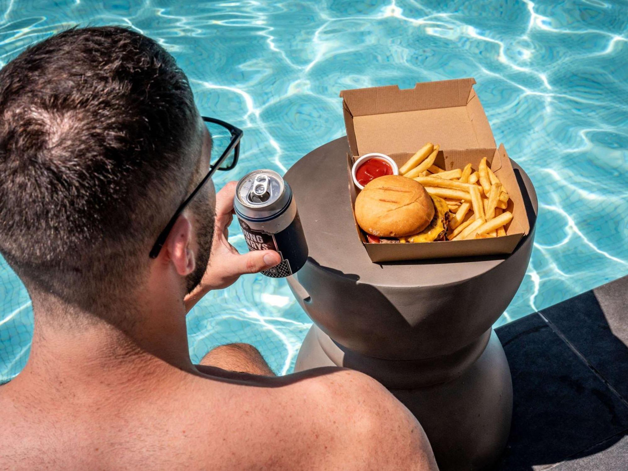 Pullman Sydney Hyde Park Hotel Екстериор снимка A floating drink and food holder